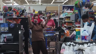Couple Who Wore Face Masks Bearing the Nazi Flag Swears They Aren't Nazis